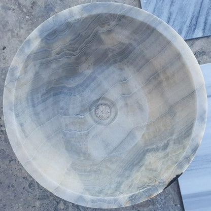 Elegant gray onyx V-shape sink showcasing contemporary design with durable, high-quality materials for modern bathrooms