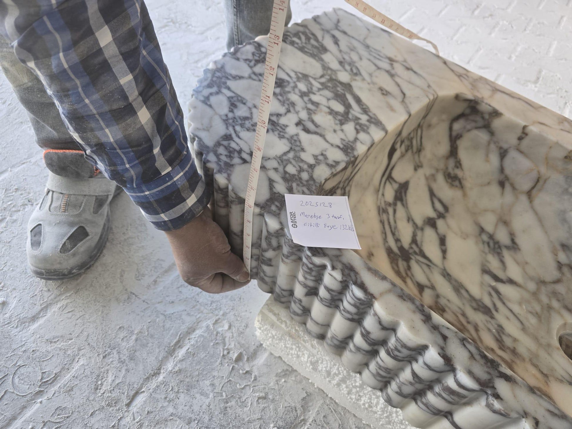 Elegant Calacatta Viola marble slab showcasing unique veining patterns and polished surface, ideal for luxurious interiors
