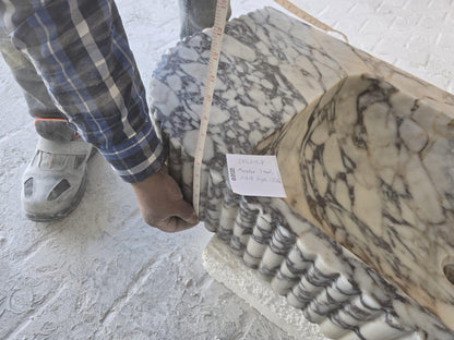 Elegant Calacatta Viola marble slab showcasing unique veining patterns and polished surface, ideal for luxurious interiors