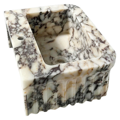 Elegant Calacatta Viola vanity sink showcasing luxurious marble veining for sophisticated bathroom design