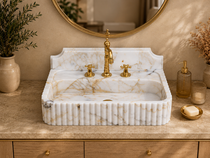 Calacatta Gold Wall-Mount Sink in natural marble — handmade stone basin, veining and tone vary from piece to piece