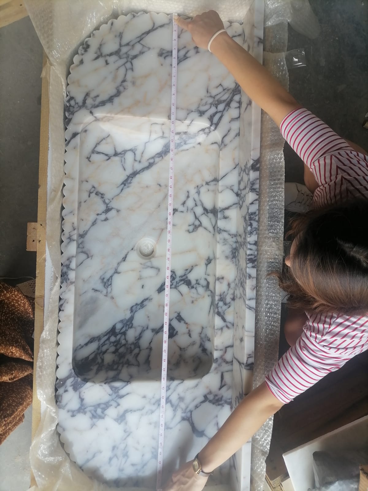 Elegant Calacatta Viola marble slab showcasing unique veining patterns and polished surface, ideal for luxurious interiors
