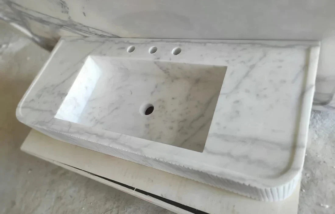 Elegant Carrara White Marble surface showcasing space-saving design for modern interiors and optimized layout.
