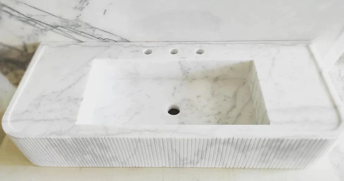 Elegant Carrara White Marble surface showcasing space-saving design for modern interiors and optimized layout.