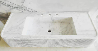 Elegant Carrara White Marble surface showcasing space-saving design for modern interiors and optimized layout.