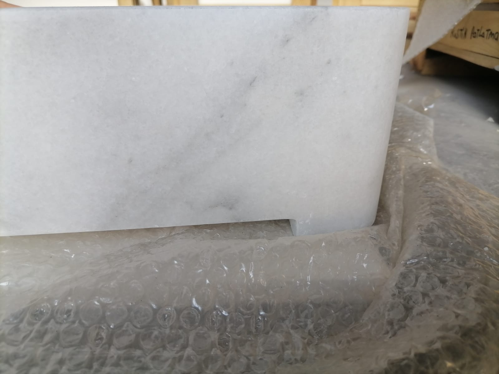 Elegant Carrara marble surface showcasing classic white and gray veining for luxurious interior designs