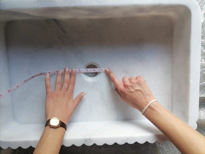 Elegant Carrara marble surface showcasing classic white and gray veining for luxurious interior designs