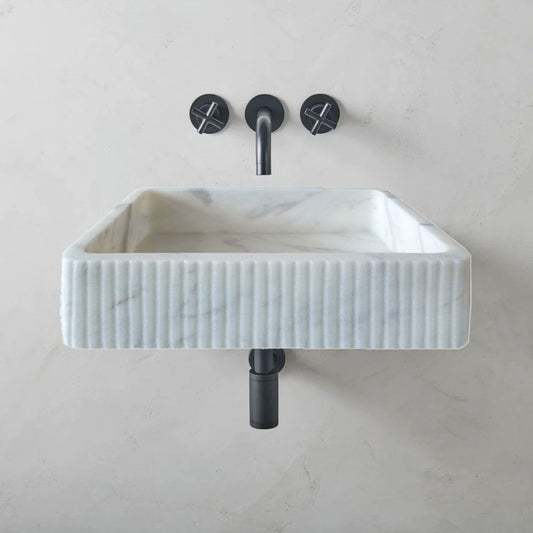 Elegant Carrara marble surface showcasing classic white and gray veining for luxurious interior designs