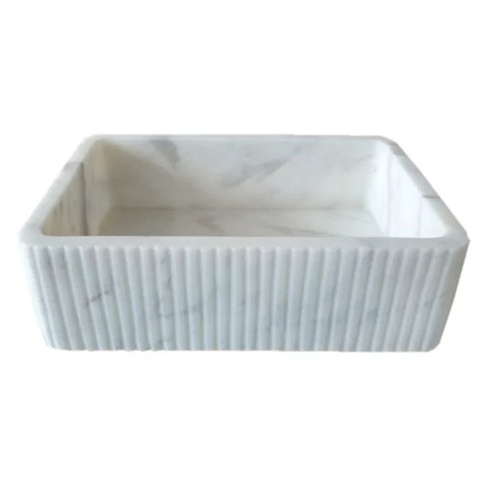 Elegant Carrara marble surface showcasing classic white and gray veining for luxurious interior designs