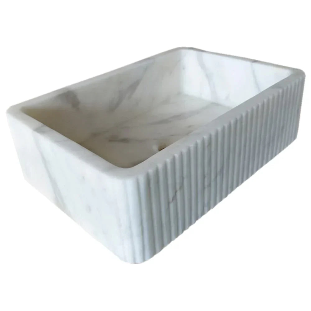 Elegant Carrara marble surface showcasing classic white and gray veining for luxurious interior designs