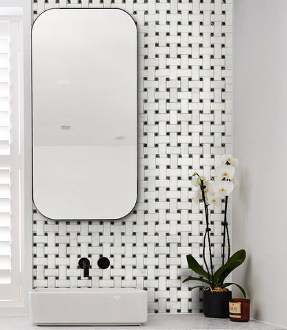 Elegant Carrara White basketweave tile pattern showcasing classic design and timeless elegance