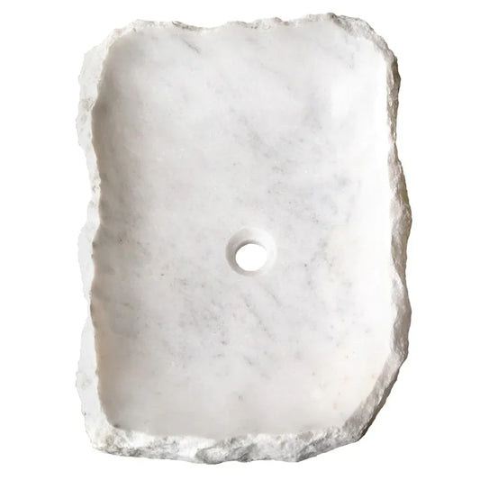 Elegant Carrara Marble surface showcasing rustic charm, perfect for timeless and sophisticated interior design.