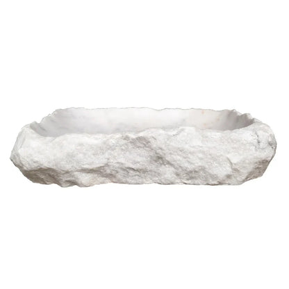 Elegant Carrara Marble surface showcasing rustic charm, perfect for timeless and sophisticated interior design.