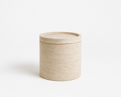 Cove Travertine Side Table handcrafted from natural beige travertine with a sculptural modern design.