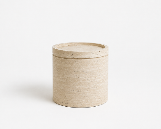 Cove Travertine Side Table handcrafted from natural beige travertine with a sculptural modern design.