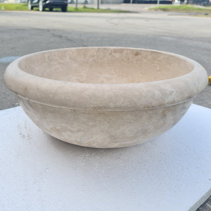Elegant design showcasing natural travertine stone surfaces for sophisticated interior and exterior decor.