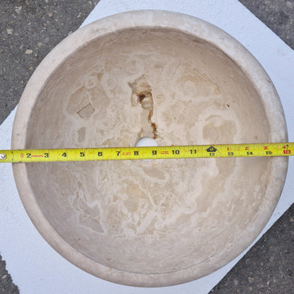 Elegant design showcasing natural travertine stone surfaces for sophisticated interior and exterior decor.
