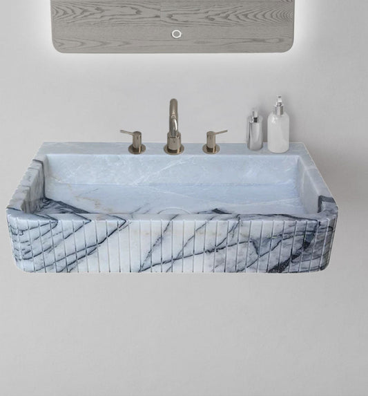 Elegant marble sink showcasing refined craftsmanship and luxurious bathroom design