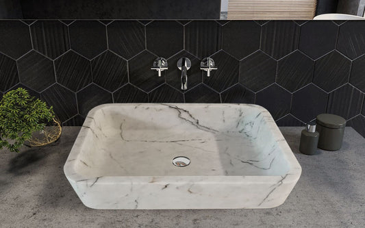 Elegant Carrara White marble sink featuring smooth craftsmanship and timeless design for luxury bathrooms