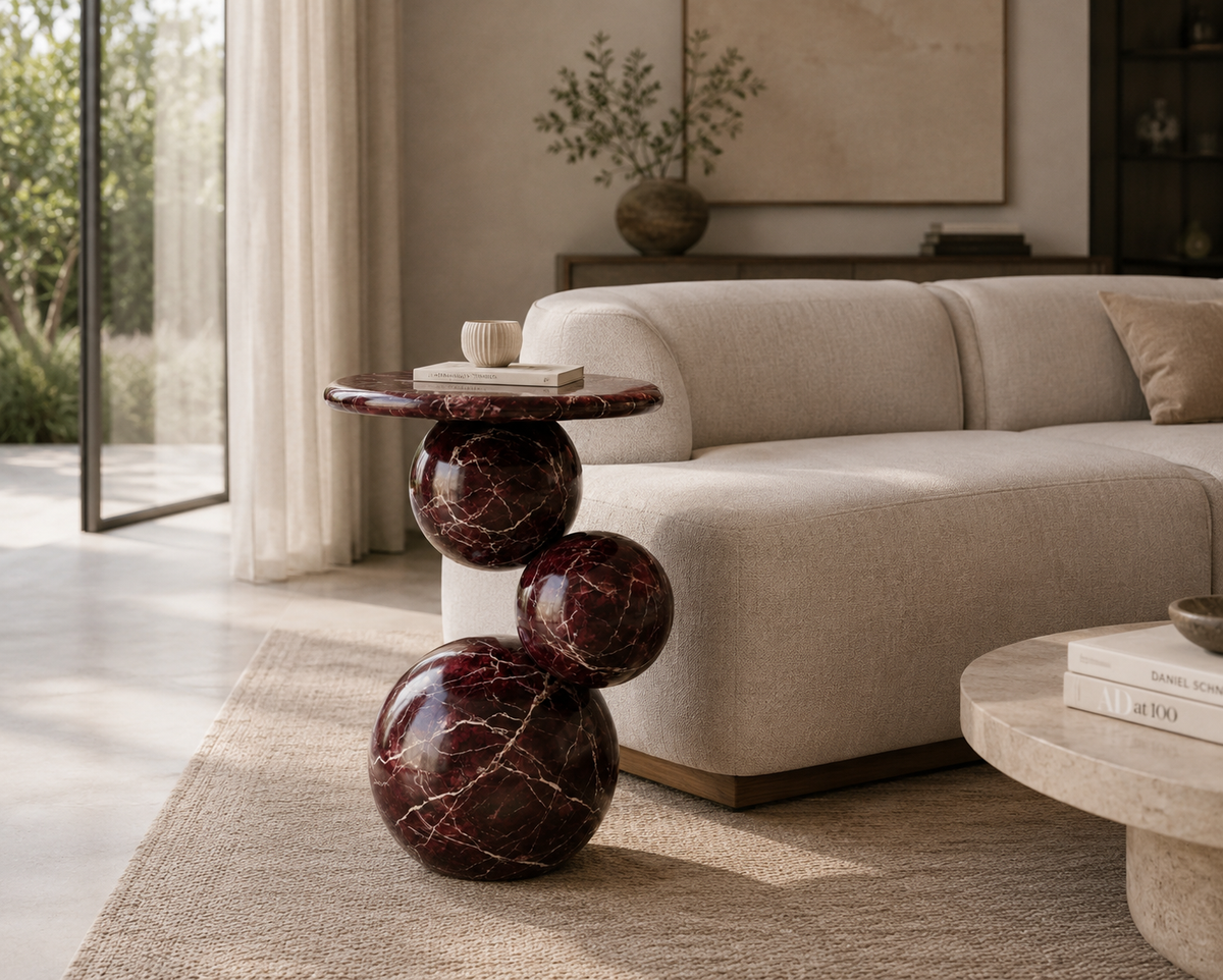 Orb Rosso Marble End Table top view highlighting the rich red marble tones and distinctive natural veining.