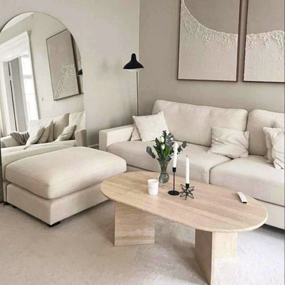 Elegant travertine coffee table showcasing natural stone texture ideal for sophisticated living room decor