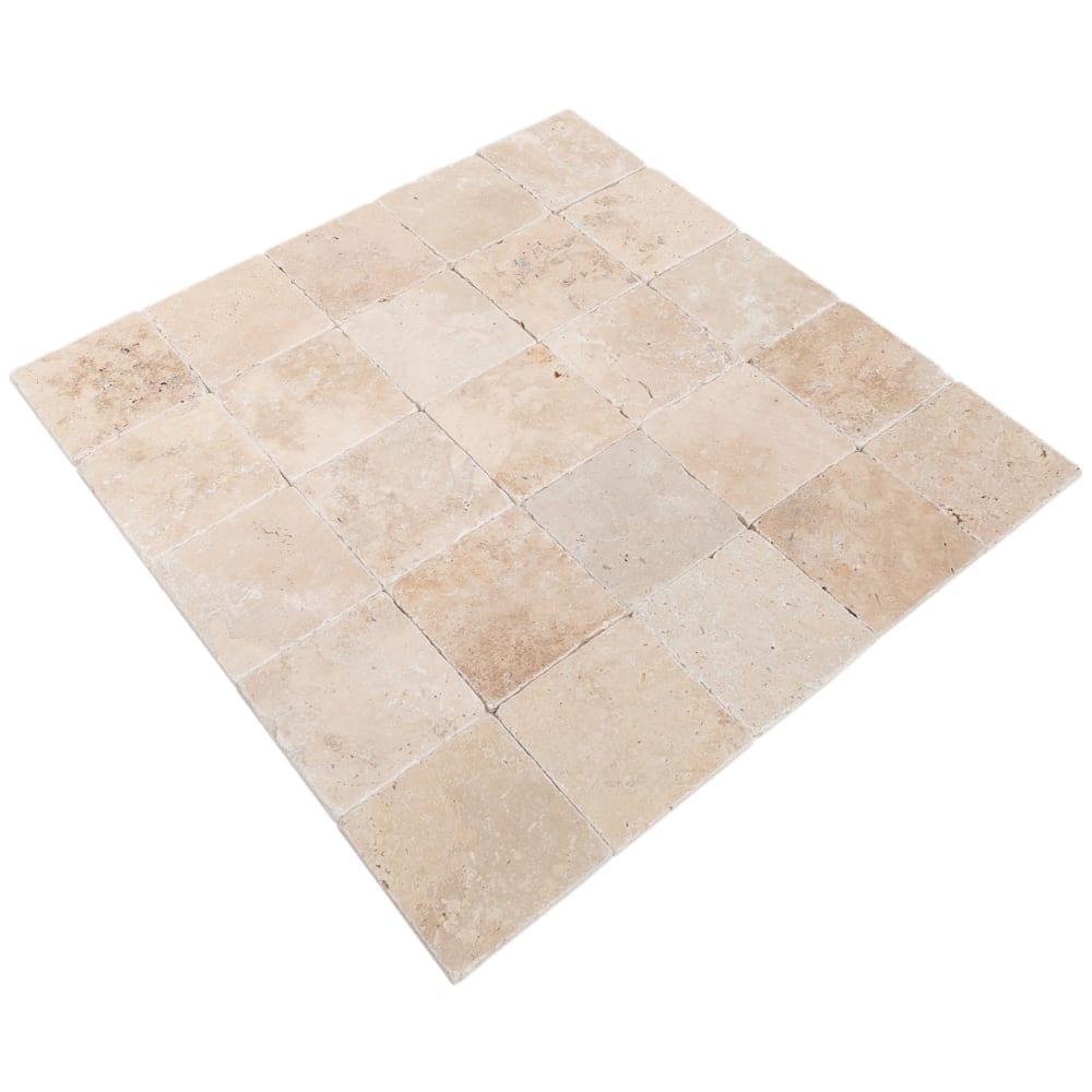 Riverbed scene showcasing smooth travertine stones along the water's edge, highlighting natural textures and serene beauty.