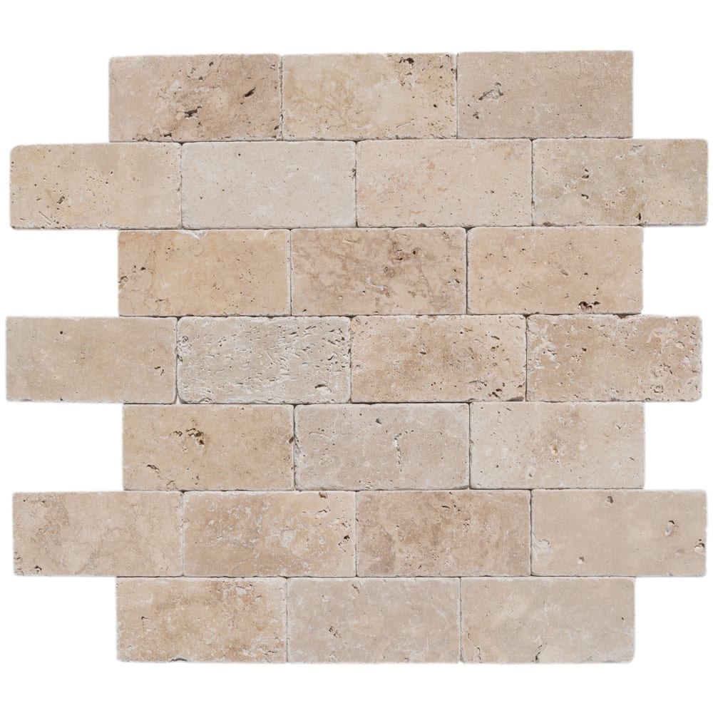 Riverbed scene showcasing smooth travertine stones along the water's edge, highlighting natural textures and serene beauty.