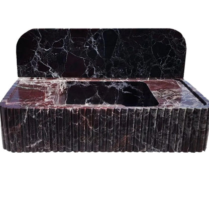 Rosso Levanto marble wall-mount feature showcasing elegant interior design and natural stone textures