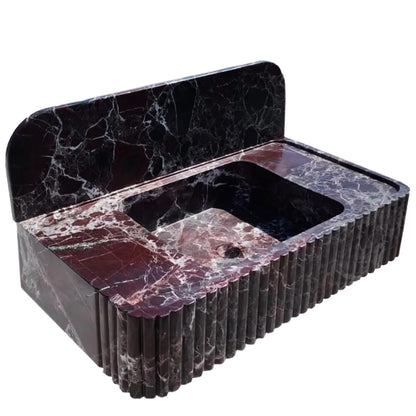 Rosso Levanto marble wall-mount feature showcasing elegant interior design and natural stone textures