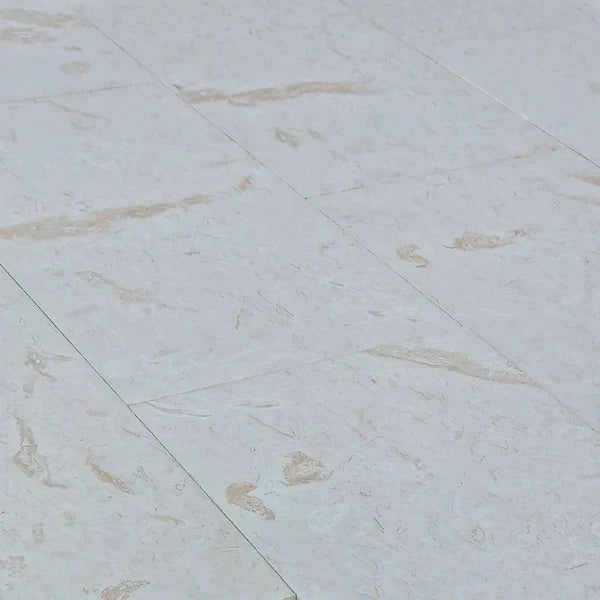 High-quality limestone pavers arranged in an elegant pattern for durable and stylish outdoor flooring solutions