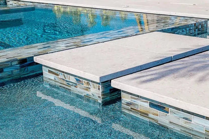 High-quality limestone pavers arranged in an elegant pattern for durable and stylish outdoor flooring solutions