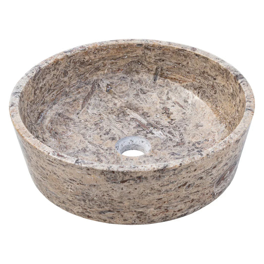 Elegant silver accents complement natural travertine textures in sophisticated interior designs.