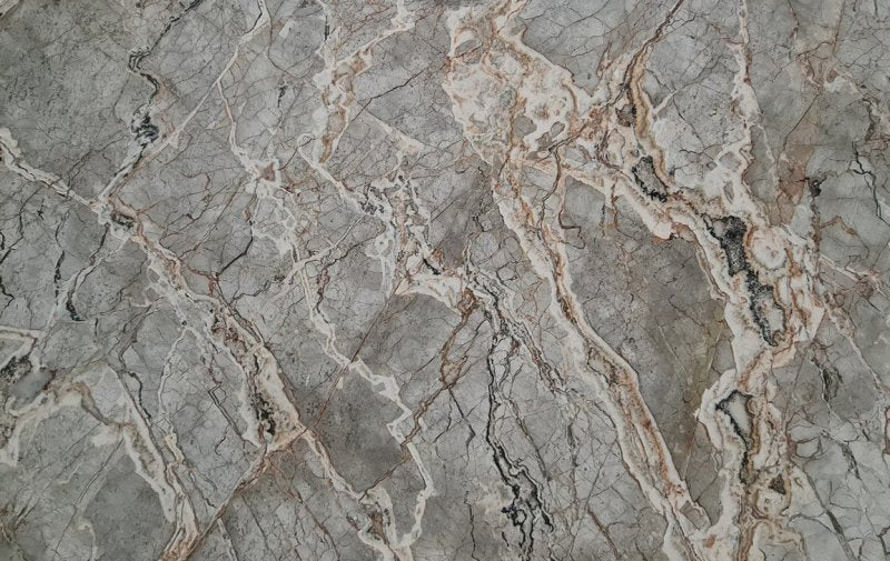 Elegant Vulcano Grey marble slabs showcasing natural stone texture for sophisticated interior design