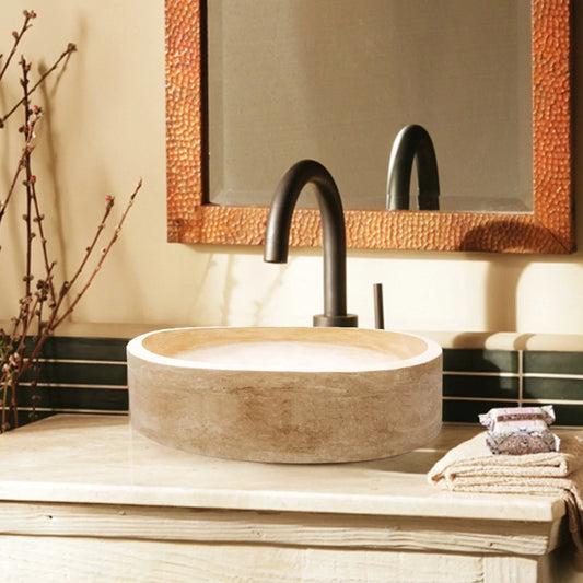 Elegant travertine bathroom sinks showcasing natural stone beauty and sophisticated home design