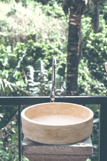 Elegant travertine bathroom sinks showcasing natural stone beauty and sophisticated home design