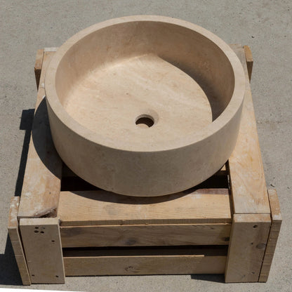 Elegant travertine bathroom sinks showcasing natural stone beauty and sophisticated home design