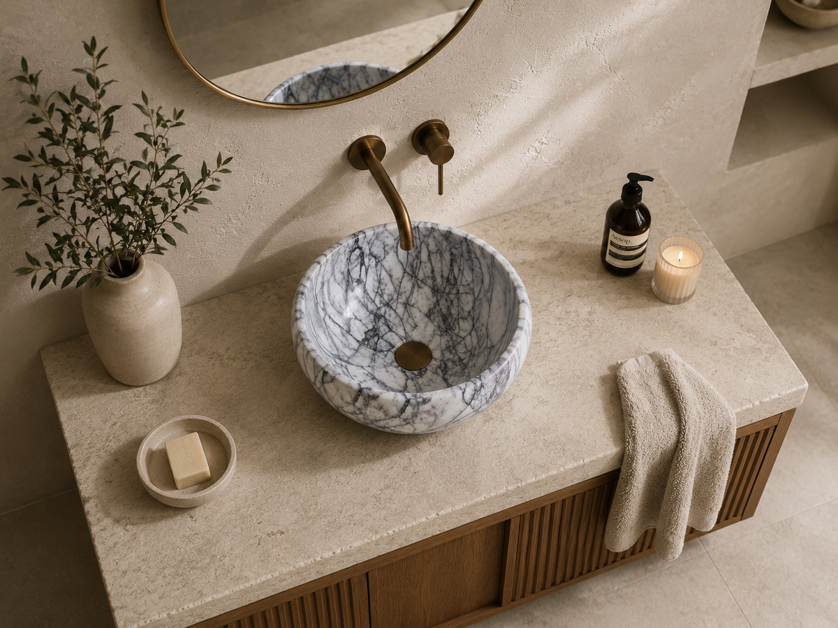 Viola Calacatta Oval Vessel Sink in natural marble — carved from a single block of natural stone, no two pieces alike