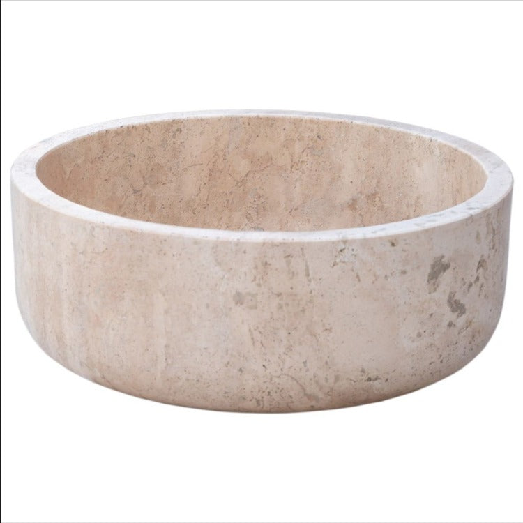Handcrafted beige travertine marble sink, round vessel basin showcasing natural texture and earthy tones.