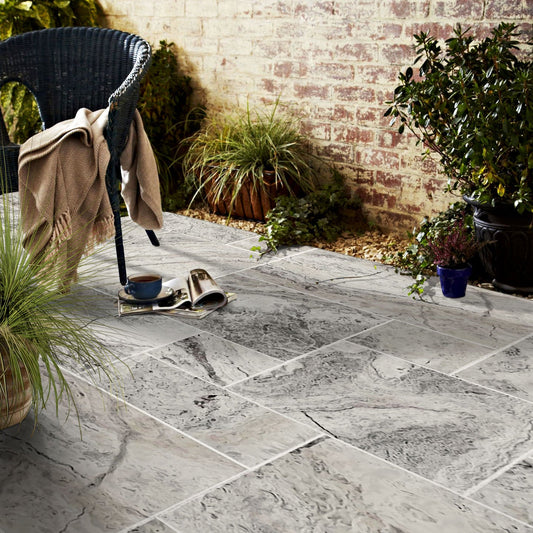 High-quality Alaska Silver travertine tiles showcasing elegant natural stone textures for sophisticated interiors