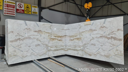 Elegant Angel White marble slabs showcasing premium quality for refined architectural designs.