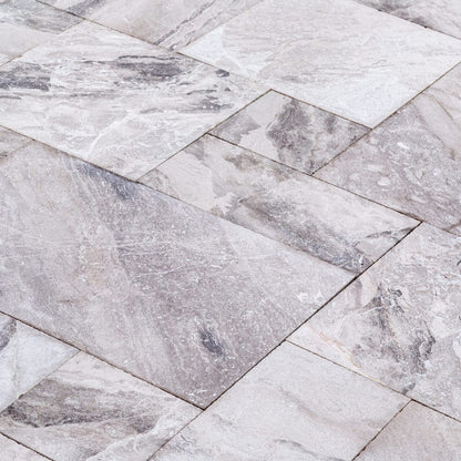 Elegant Atlantic Grey marble tiles showcasing natural patterns for sophisticated interior designs