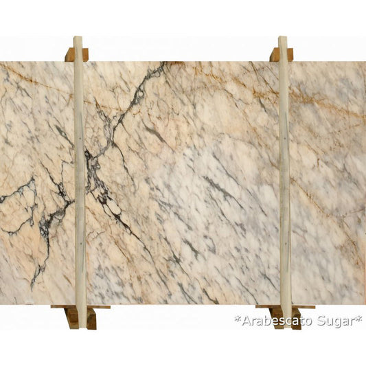 Elegant Arabescato marble slab showcasing unique veining patterns ideal for luxury interior design applications.