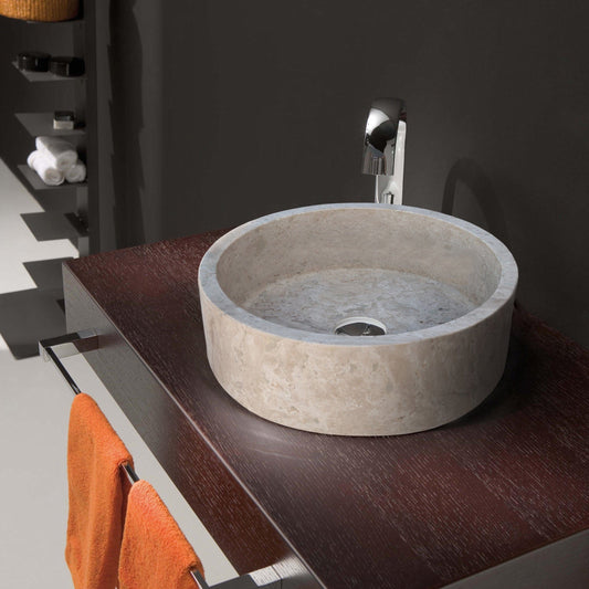Elegant travertine sink showcasing natural stone texture for luxurious bathroom design and durability