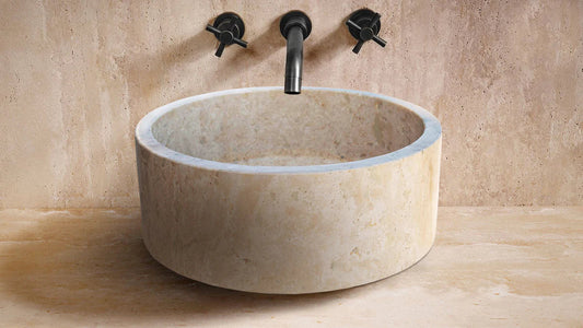 Elegant travertine sink showcasing natural stone texture for luxurious bathroom design and durability