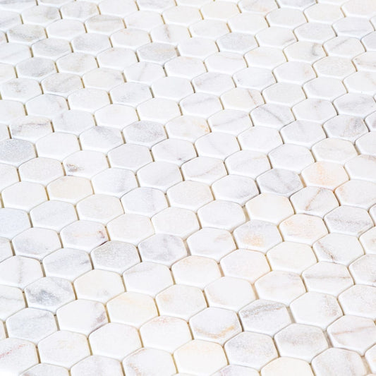 Elegant Bianco marble surface showcasing natural white veining for sophisticated interior design and architectural projects.
