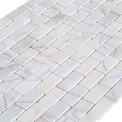 Elegant Bianco marble surface showcasing natural white veining for sophisticated interior design and architectural projects.