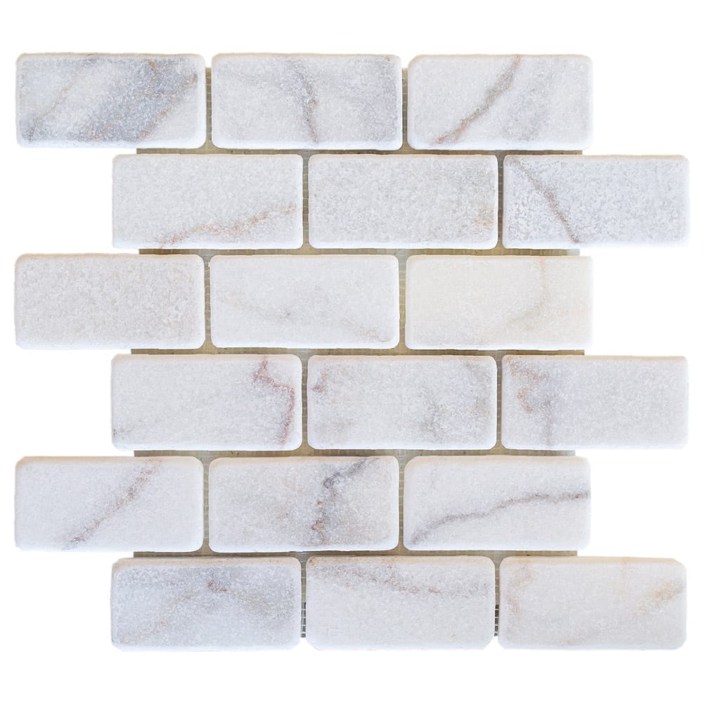 Elegant Bianco marble surface showcasing natural white veining for sophisticated interior design and architectural projects.
