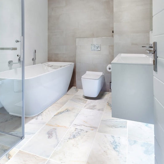 Elegant Bianco marble surface showcasing its pristine white color and natural veining for interior design applications