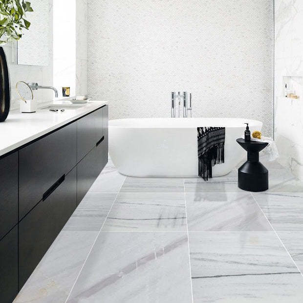 Elegant Bianco Lasa marble tiles showcasing natural beauty and premium quality for sophisticated interior designs.