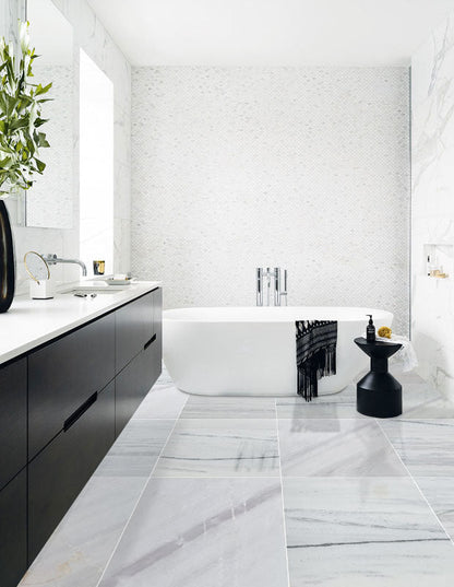 Elegant Bianco Lasa marble tiles showcasing natural beauty and premium quality for sophisticated interior designs.